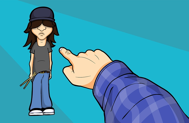 A cartoon hand points accusingly at a scruffy drummer wearing a cap and holding drumsticks.